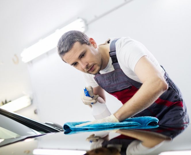 3 Polishing car with spray and microfibre cloth