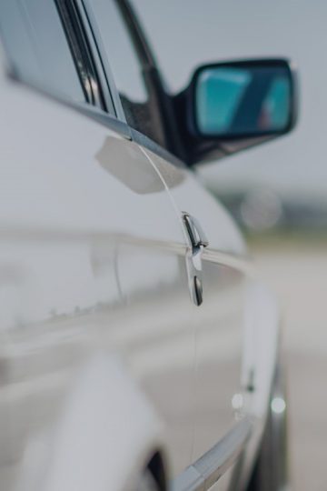 Side view of white car