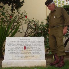 Sam next to the monument of the FSSF in Menton, on the french-italian border. (Gilles Guignard)