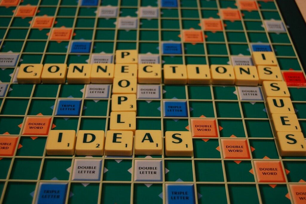 Scrabble - metaphor for cooperation, contemplation and teamwork.