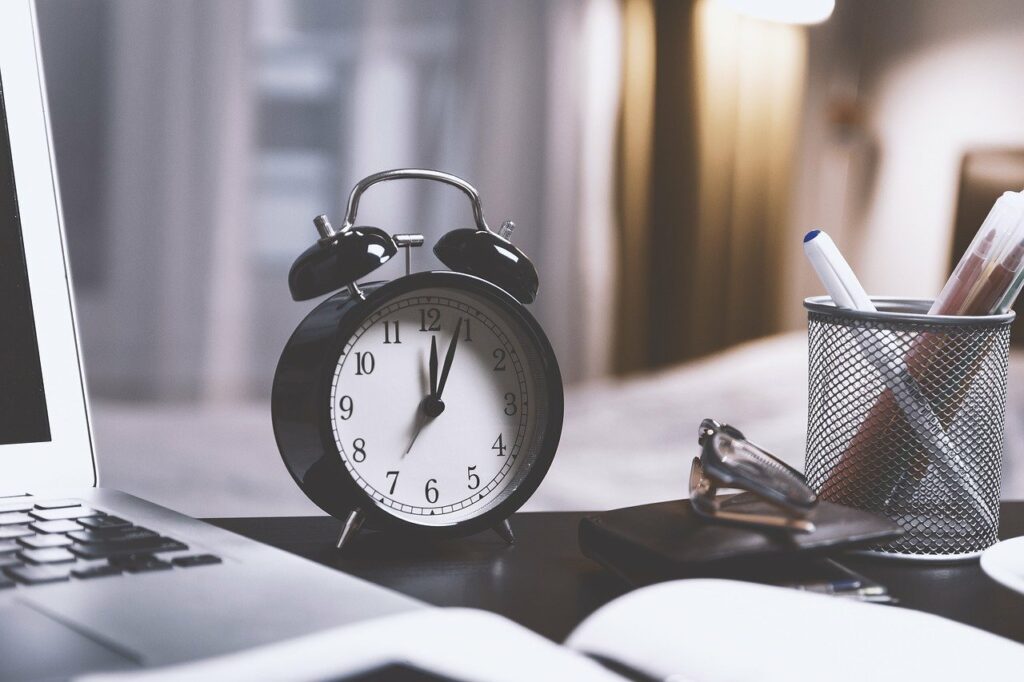 Clock on desk in work from home environment