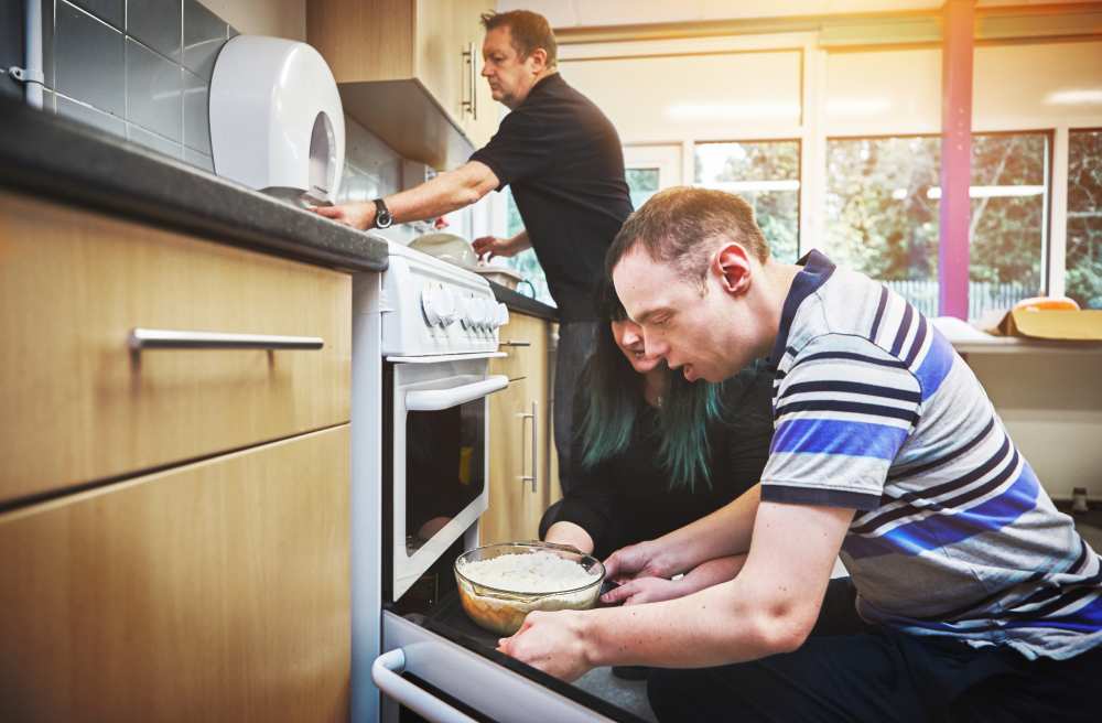 healthcare facility teaches man how to cook to live independently