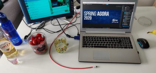 image of a laptop showing the Spring Agora 2020 platform