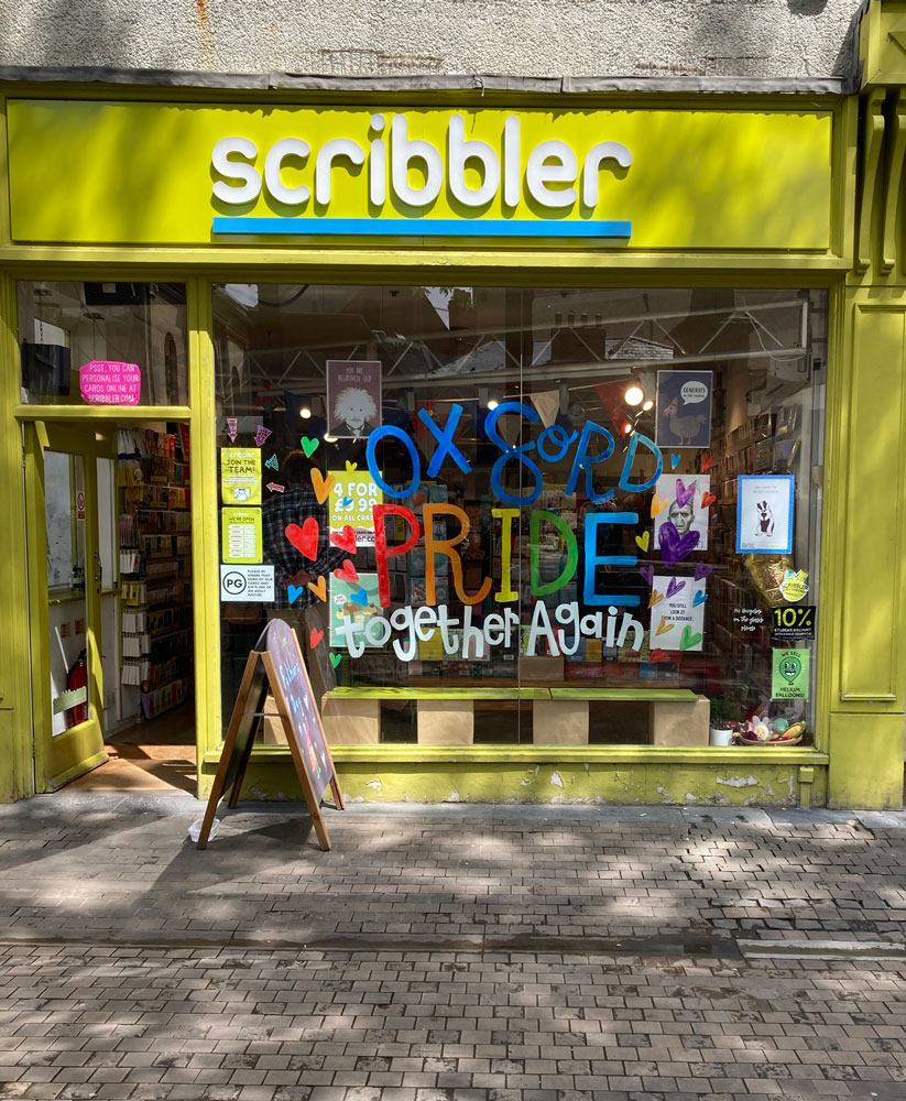 Window mural in progress! “Oxford PRIDE, together again 2022,” commissioned by Scribbler, New Inn Hall St, Oxford.