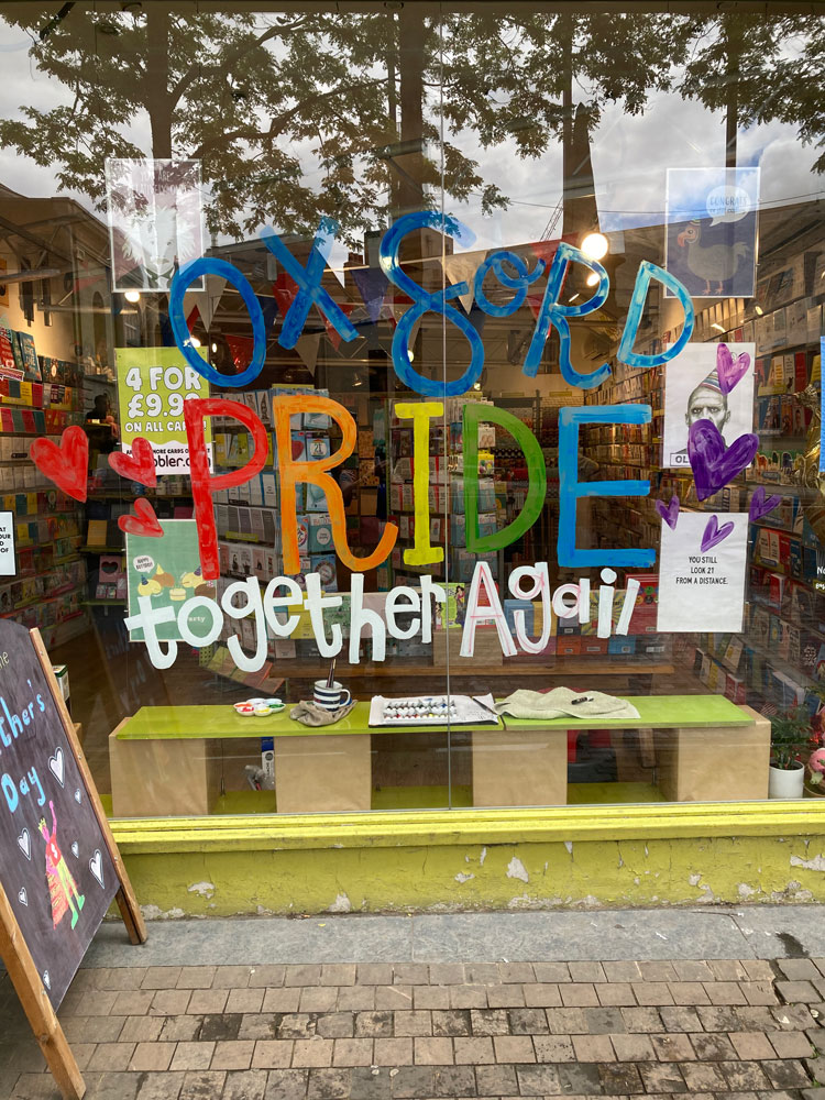 Window mural in progress! “Oxford PRIDE, together again 2022,” commissioned by Scribbler, New Inn Hall St, Oxford.