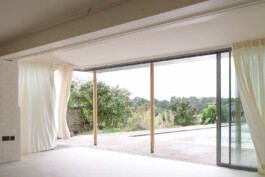 The view from Phase 1 extension overlooking the family swimming pool Alexander Hills Architects