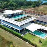 Exquisite Beachfront Villa in Mai Khao for Sale - A Modern Marvel with Private Shoreline and Dual Pools