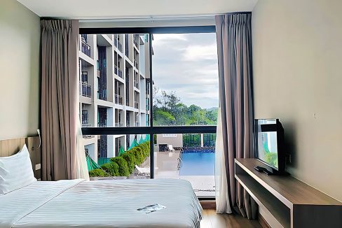 Stylish 61 sqm 2-Bedroom Condo for Sale at Sugar Palm Suan Luang, Phuket with Stunning Pool Views