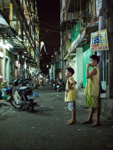 Ho- Chi- Minh city, city district, at night, kids, aim-frame photography