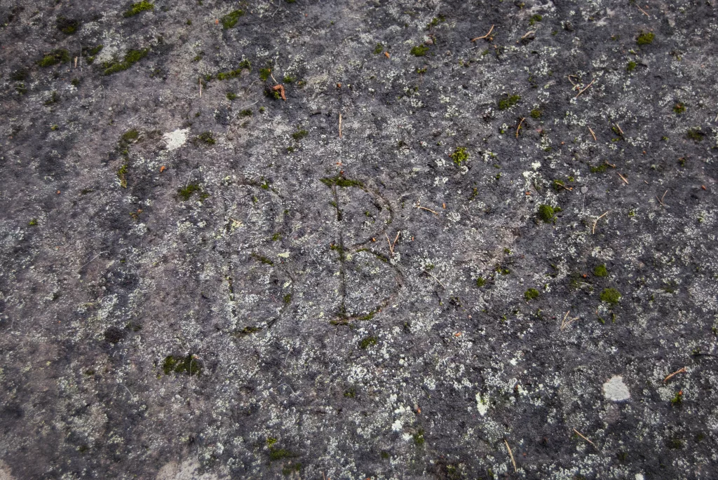 Photograph of the more recent graffiti among the petroglyphs at Bogge.