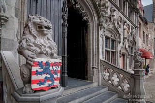 The two lions and their plaque in front of the Basilica of the Holy Blood in Brugge, Belgium