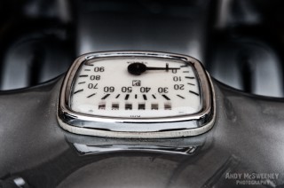 Detail shot of a speedometer on a vintage Vespa scooter during Mod Days Brugge, Belgium