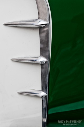Detail shot of chrome and green on a vintage Vespa scooter during Mod Days Brugge, Belgium