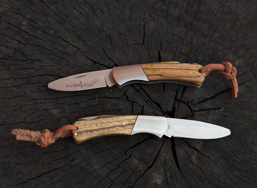 Foldekniv med bladlås uden spids, skæfte af zebratræ