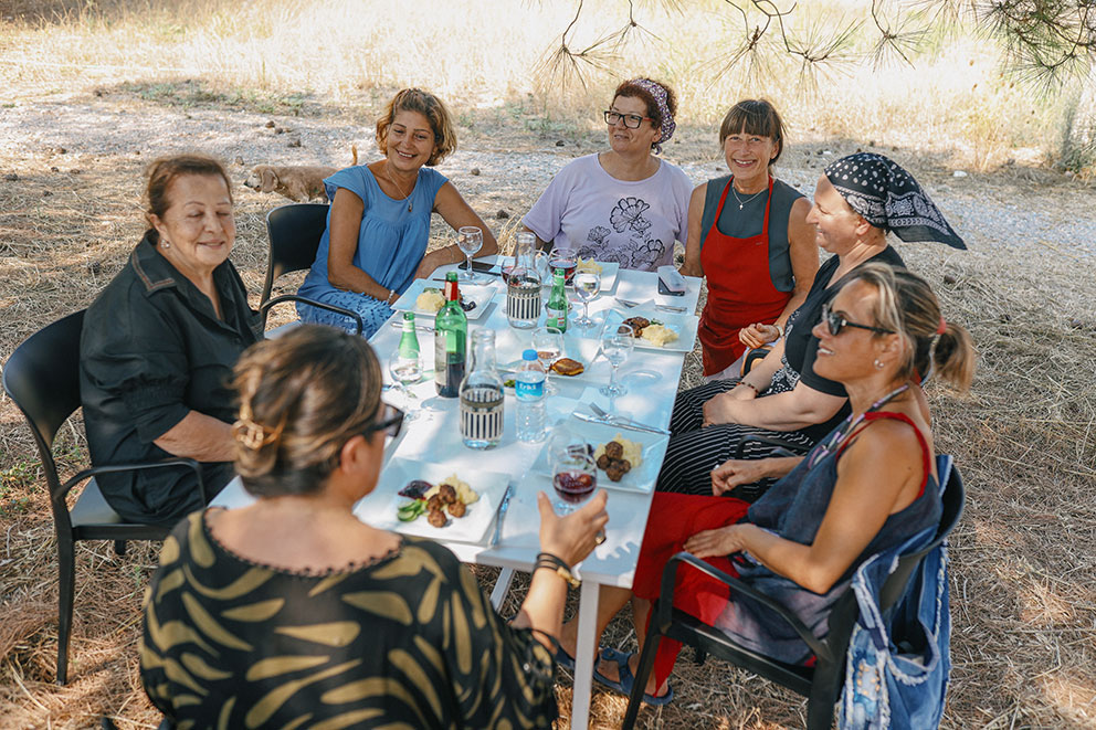 Women weave together for peace and freedom.