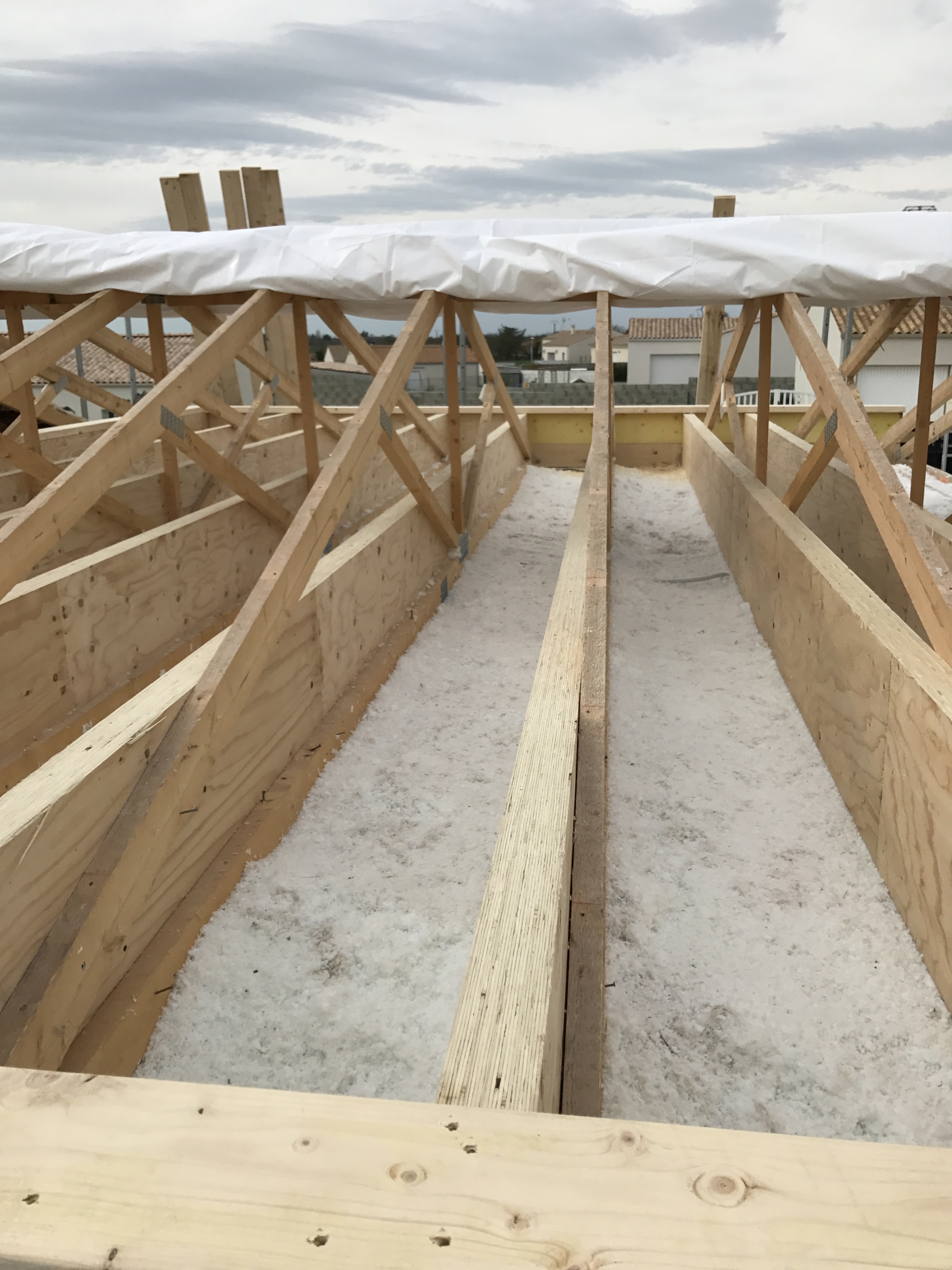 Etape de la surélévation de maison pose de plancher