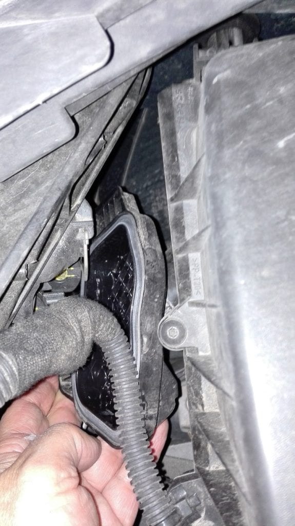 How to replace the headlight bulb in a Vauxhall Corsa D Auto Repair Focus