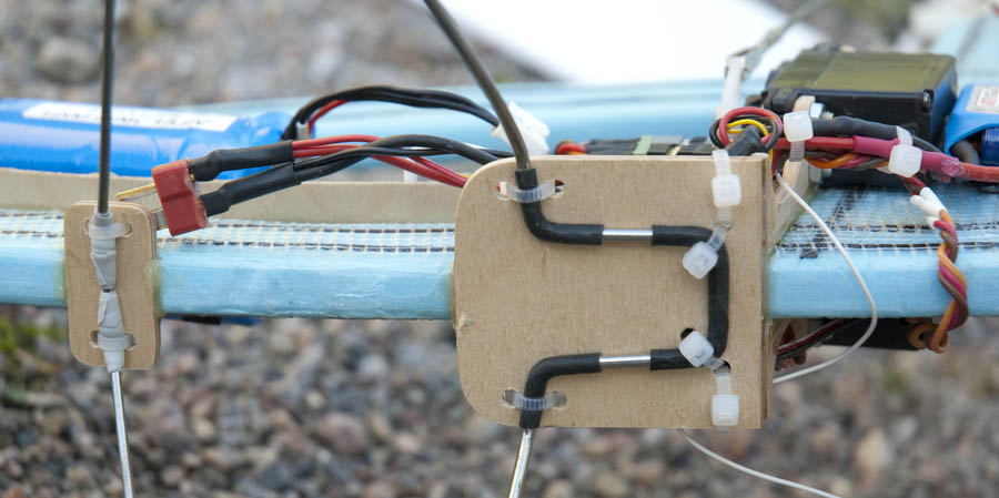 The landing gear is mounted to the fuselage using zip ties. 