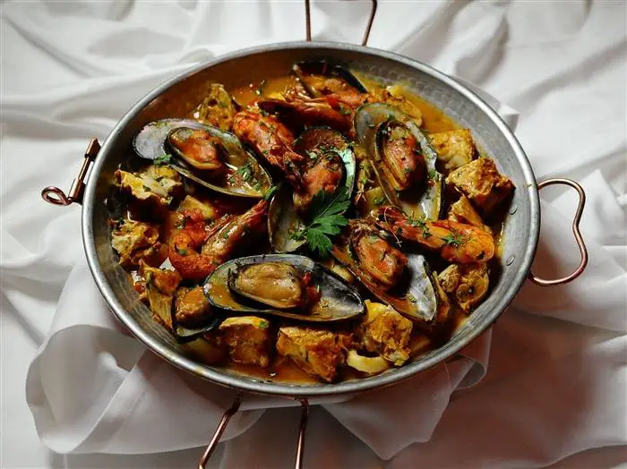 Cataplana de mariscos is typical of Algarve, contains various shellfish and mollusks