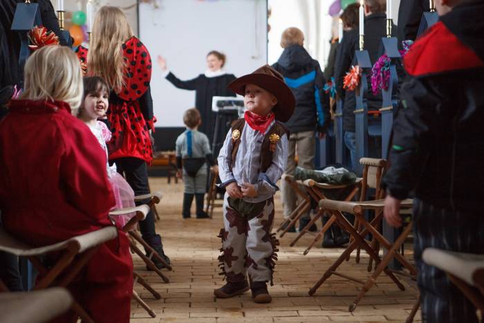 Children in communities and schools wear costumes during Fastelavn