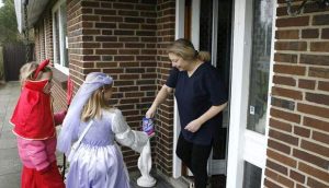 Children beg for candy from neighbors and residents of their neighborhoods during the Fastelavn