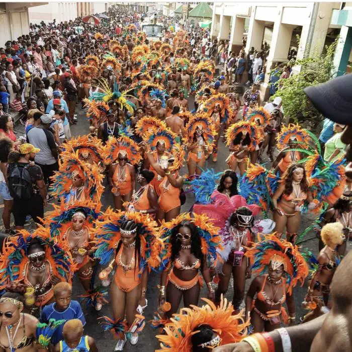 Hundreds of people gather on the streets during St. Vincent and the Grenadines Vincy Mas