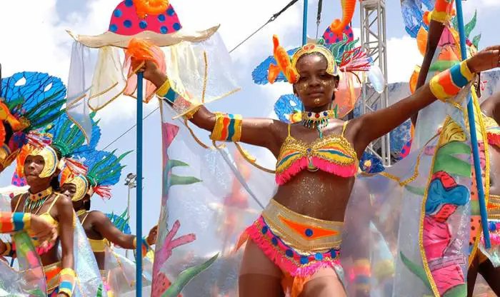 People parade in the streets during St. Vincent and the Grenadines Vincy Mas