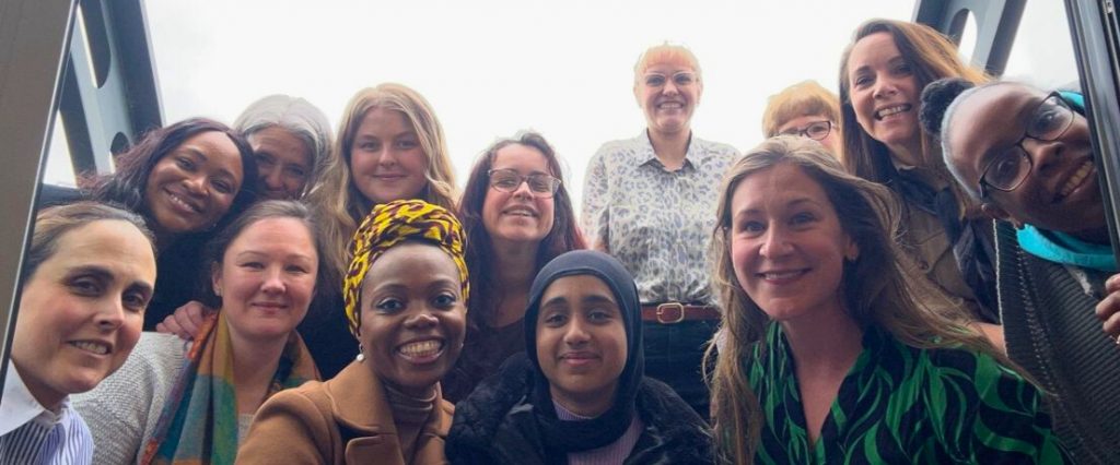 Photo of a group of women smiling