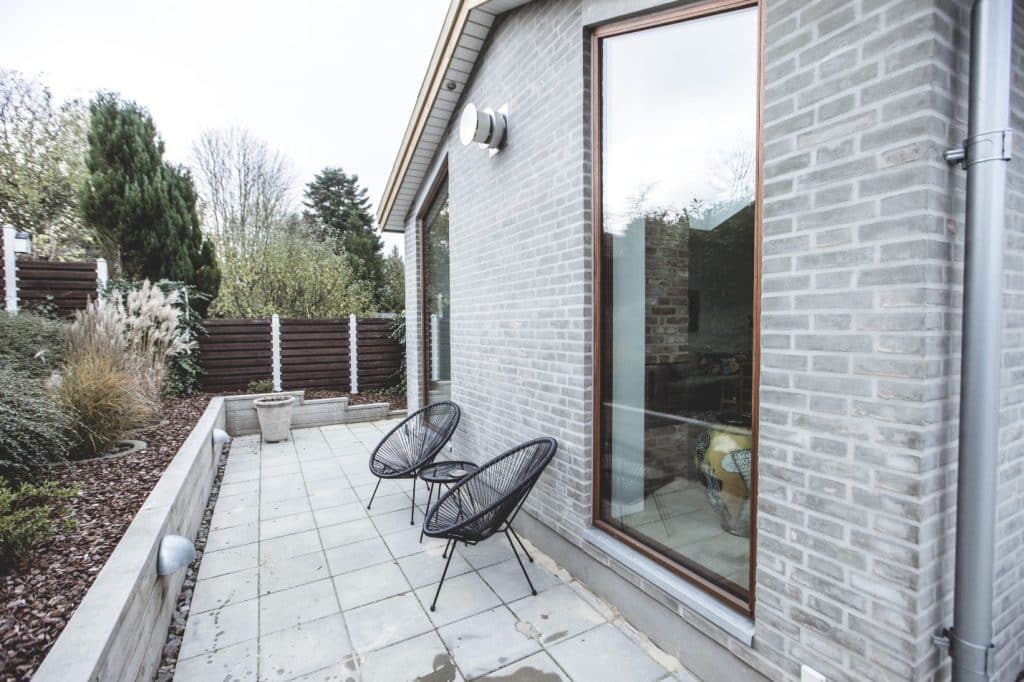 Facaderenovering - pudsning af murstensbygning - Bjarne Larsen