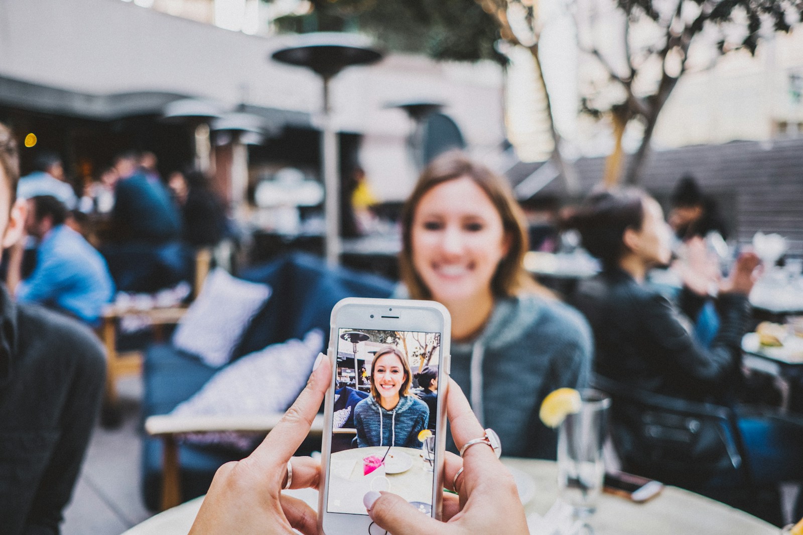 How Social Media Influences Consumer Behavior person taking photo of woman