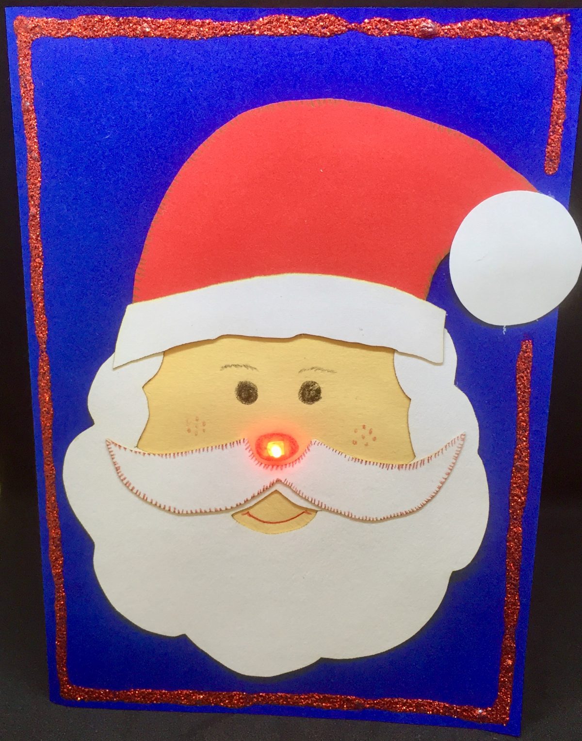 http://blog.forschenfuerkinder.de/2017/12/15/leuchtende-weihnachtskarten/ Weihnachtskarte Weihnachtsmann LED Stromkreis