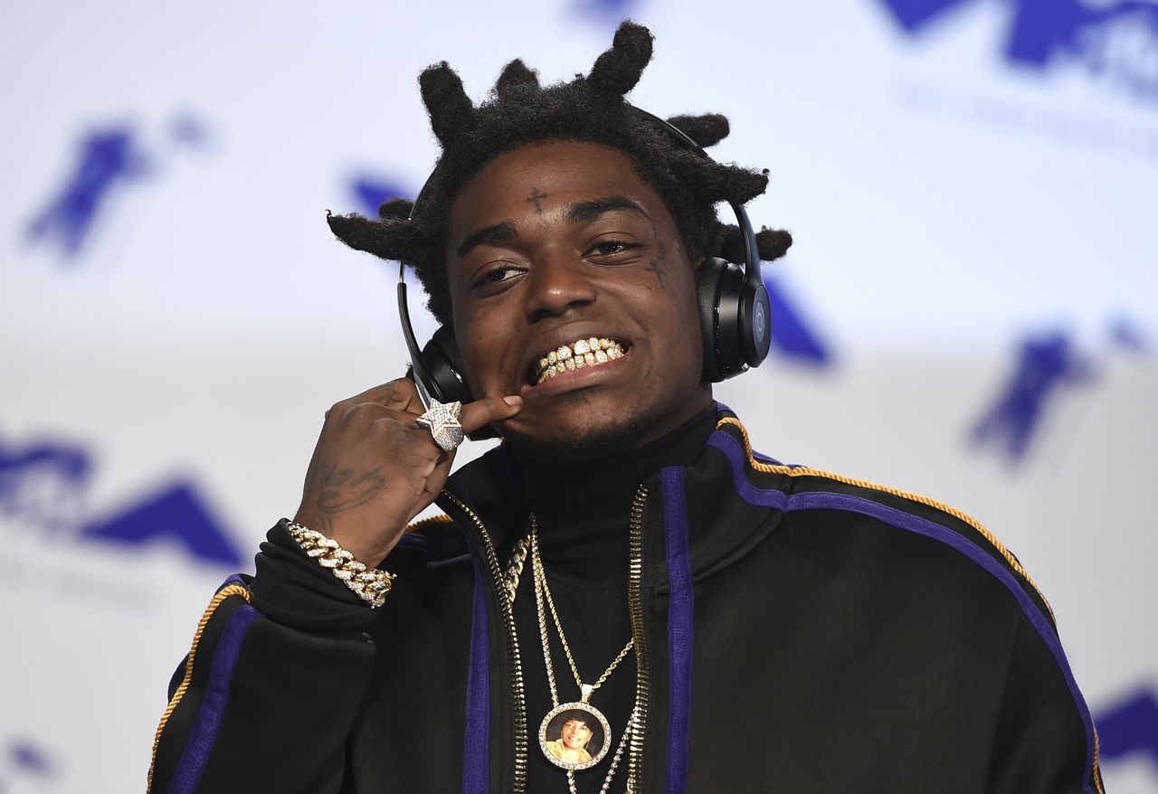 Rapper Kodak Black, Three Others Shot At Justin Beiber's Super Bowl party, kodak black teeth diamonds, kodak black teeth cost, kodak black teeth 2021, kodak black gold teeth, kodak black grillz, kodak black braids, kodak black gold grillz, kodak black grill cost