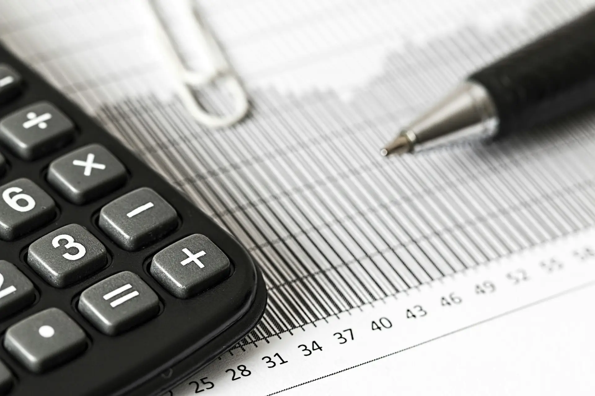 Closeup calculator and pen