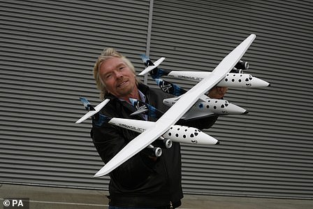 Richard Branson with the Virgin Galactic craft