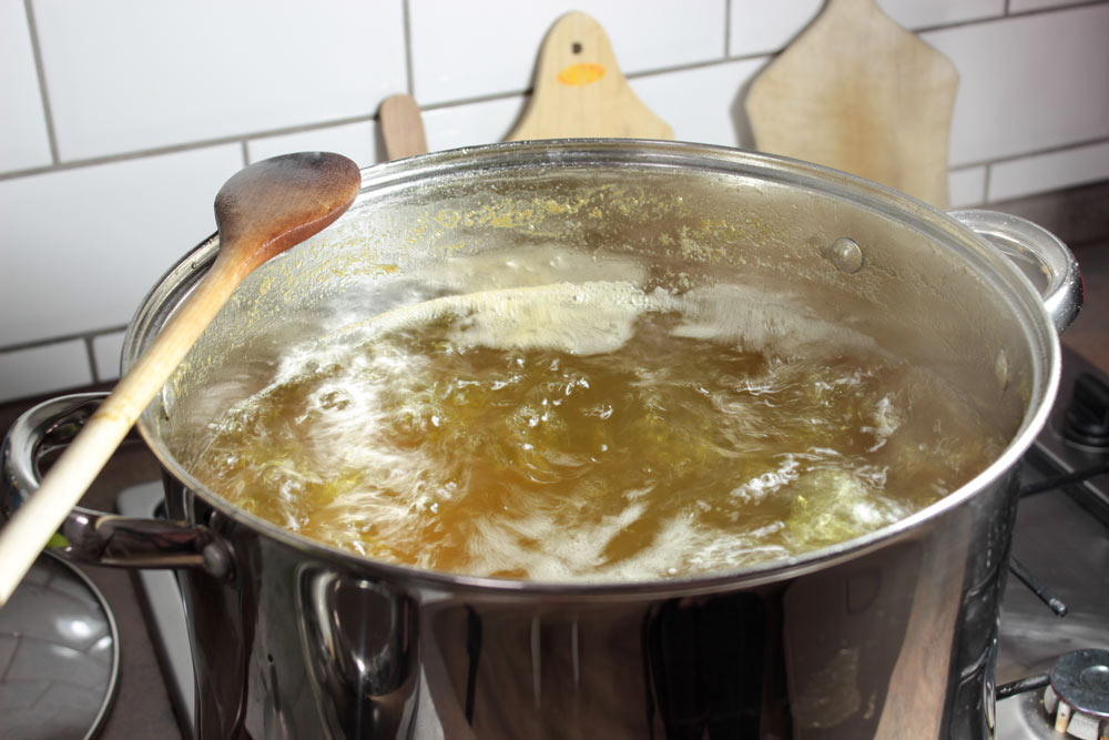 Boiling elderflower syrup