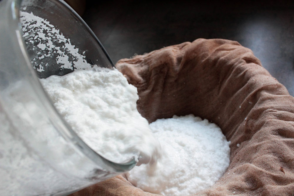 Straining coconut milk