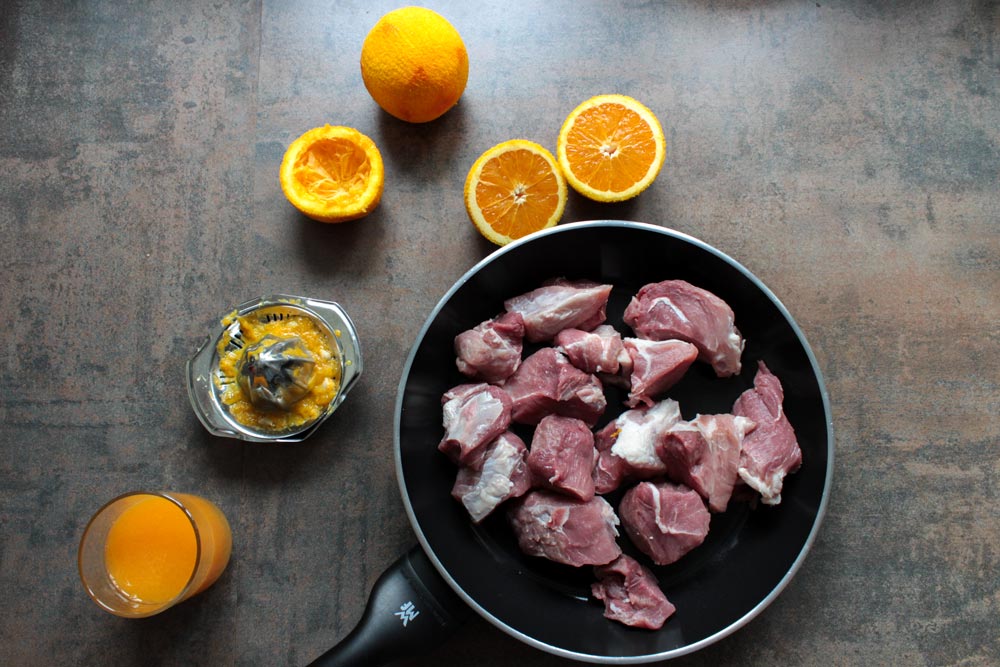 Tacos with pulled pork in juicy orange sauce