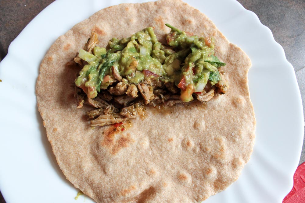 Tortilla with pulled pork and guacamole