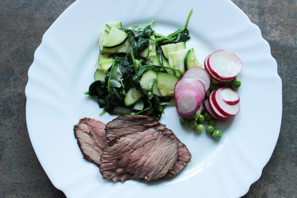 Blanched vegetables and roast beef