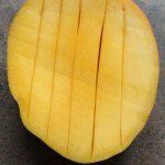 Cut mango in stripes