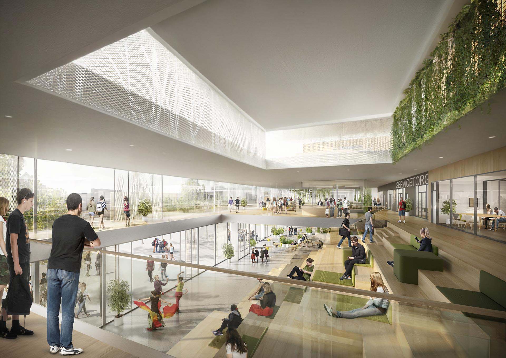 <strong>Tangvall VGS</strong> Interior view of the Upper Secondary School in Tangvall Kristiansand Norway designed by L2 Arkitekter featuring an open multi-level space with natural light indoor greenery and students engaging in various activities