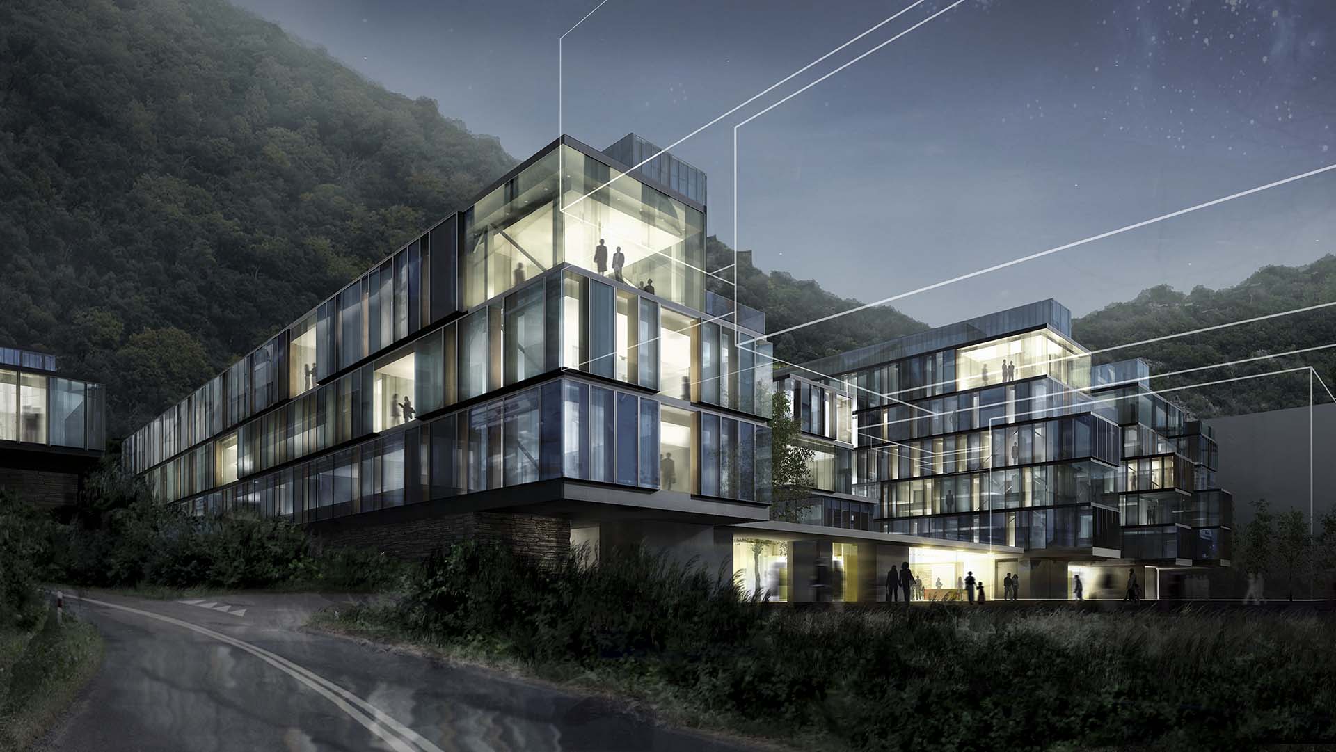 <strong>Haukeland University Hospital</strong> A nighttime exterior view of Haukeland University Hospital in Bergen, Norway. The hospital features stacked glass volumes with illuminated interiors, nestled against a mountainous backdrop.