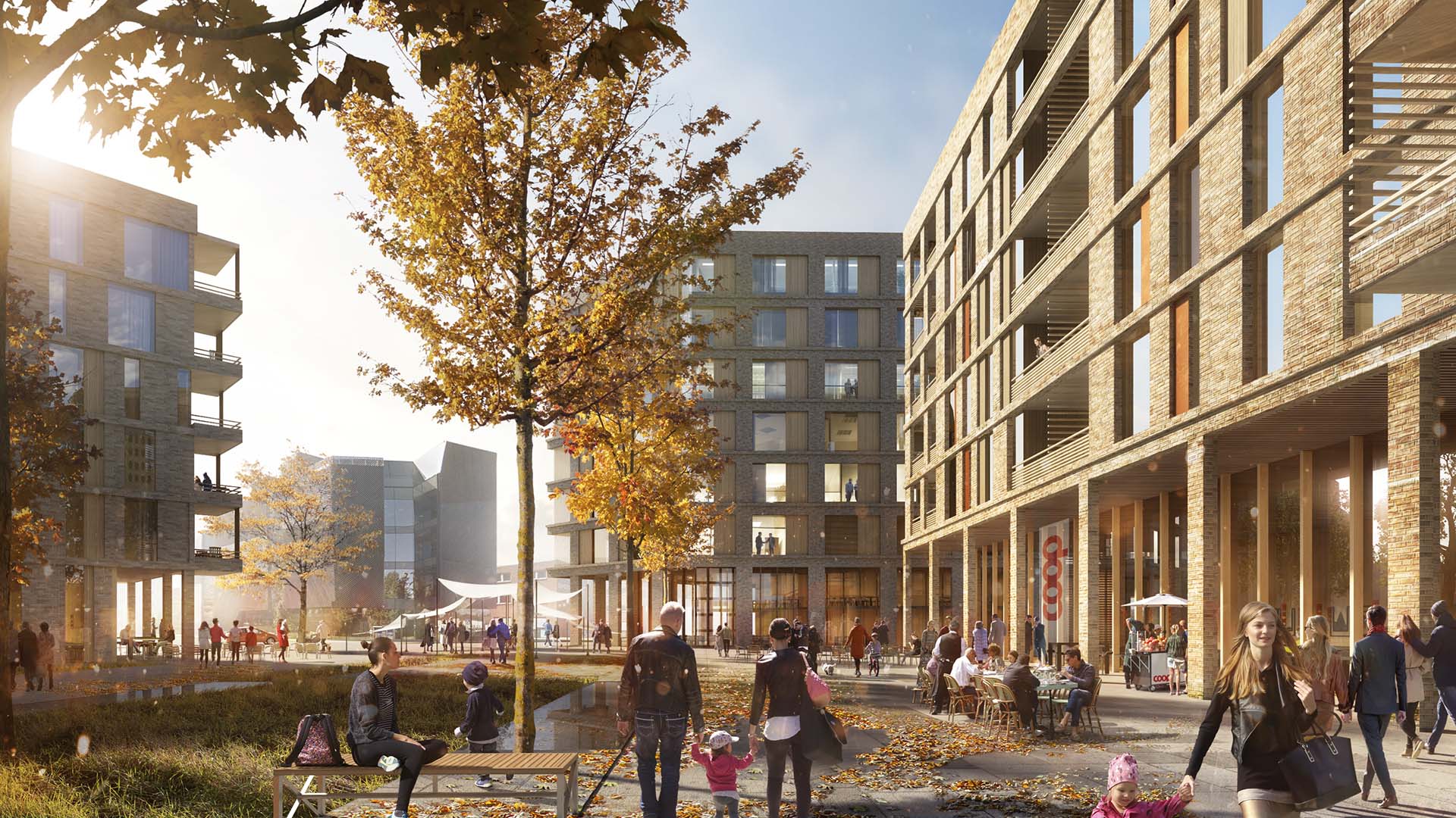 <strong>Nittedalsgata 50 – Residential Masterplan</strong> Daylight exterior view of the Residential Masterplan in Lillestrøm Norway designed by HRTB AS Arkitekter showing vibrant urban life with people walking sitting and engaging in outdoor activities among modern buildings and autumn trees