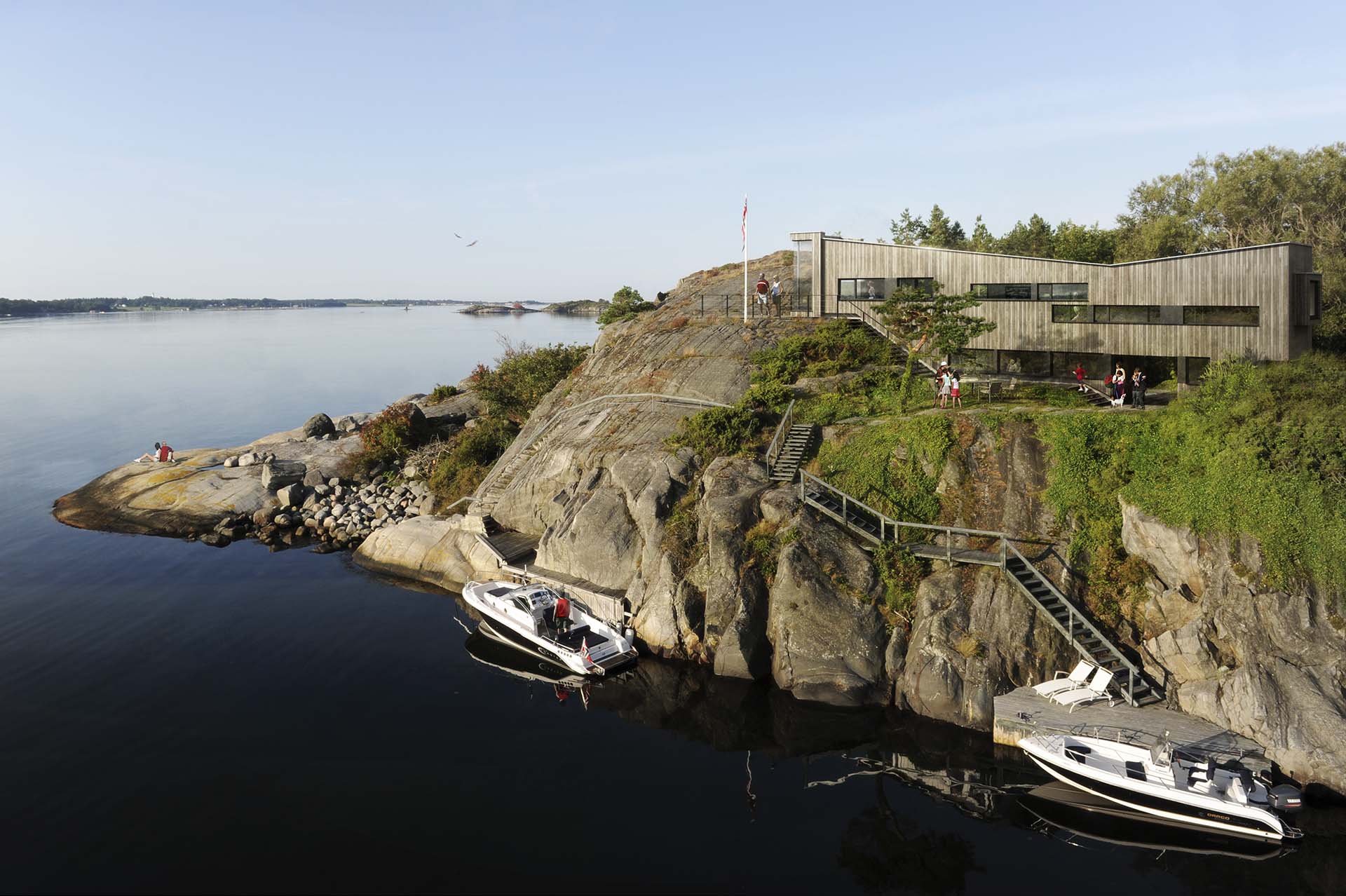 <strong>Parisholmen Private Resisdence</strong> Parisholmen Private Residence by Skaara Arkitekter in Norway is a waterfront home integrated into the rocky landscape with panoramic sea views