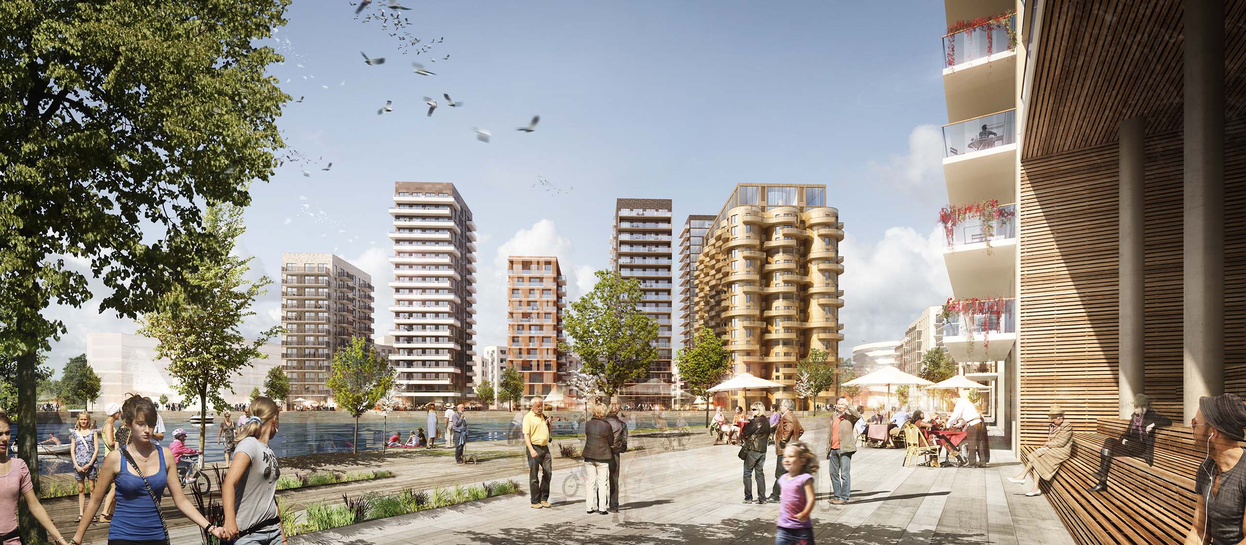 <strong>Västerås Hamn Masterplan</strong> Waterfront view of Västerås Hamn mixed-use development in Sweden, designed by ETTELVA Arkitekter, featuring modern residential towers, commercial spaces, and a lively pedestrian promenade along the canal.