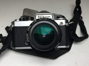Camera Nikon FE met nikkor lens