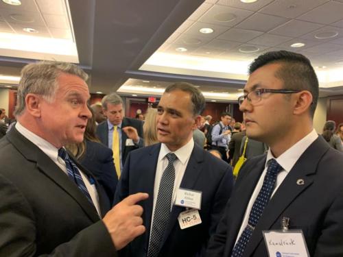 Dr. Rishat Abbas and Kamalturk Yalkun with Congressman Chris Smith