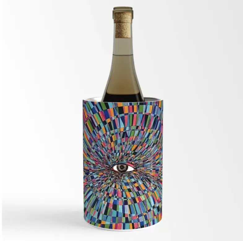 Carlos Simpson artwork on wine bottle cooler – vibrant kaleidoscopic design with central all-seeing eye, representing the fusion of art, product design, and brand innovation.