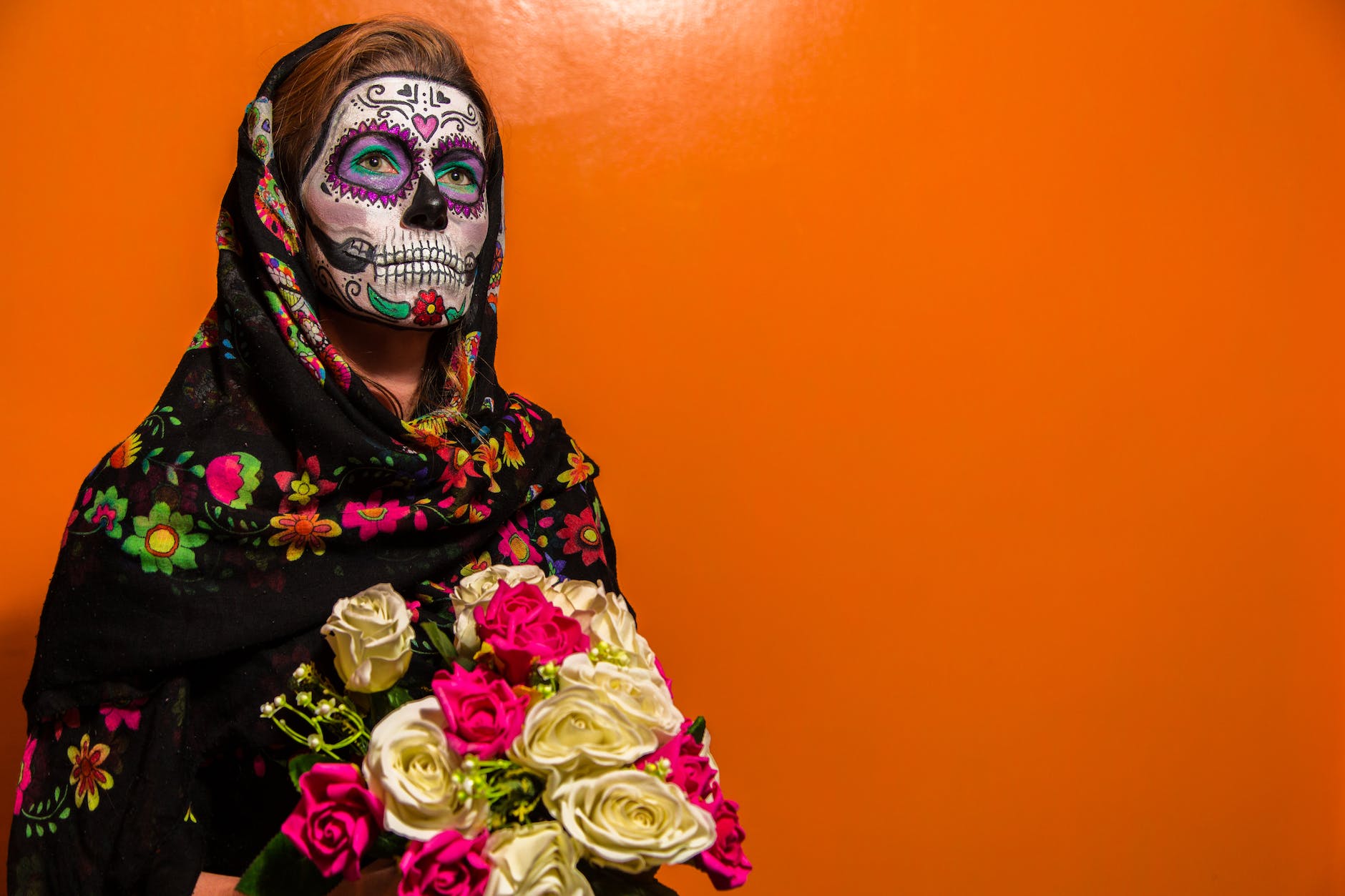 photo of woman with face paint