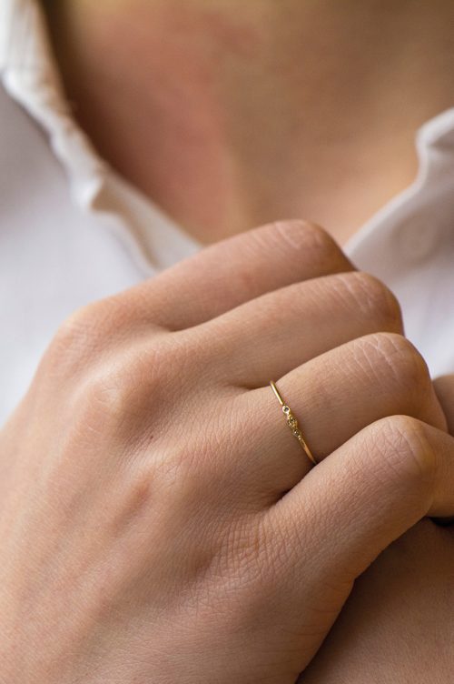 yellow gold protection and believes tiny diamonds eyes ring celine daoust